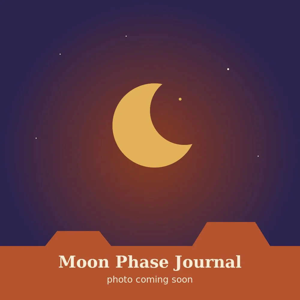 Brown leather journal cover engraved with a row of moon phases above a desert horizon
